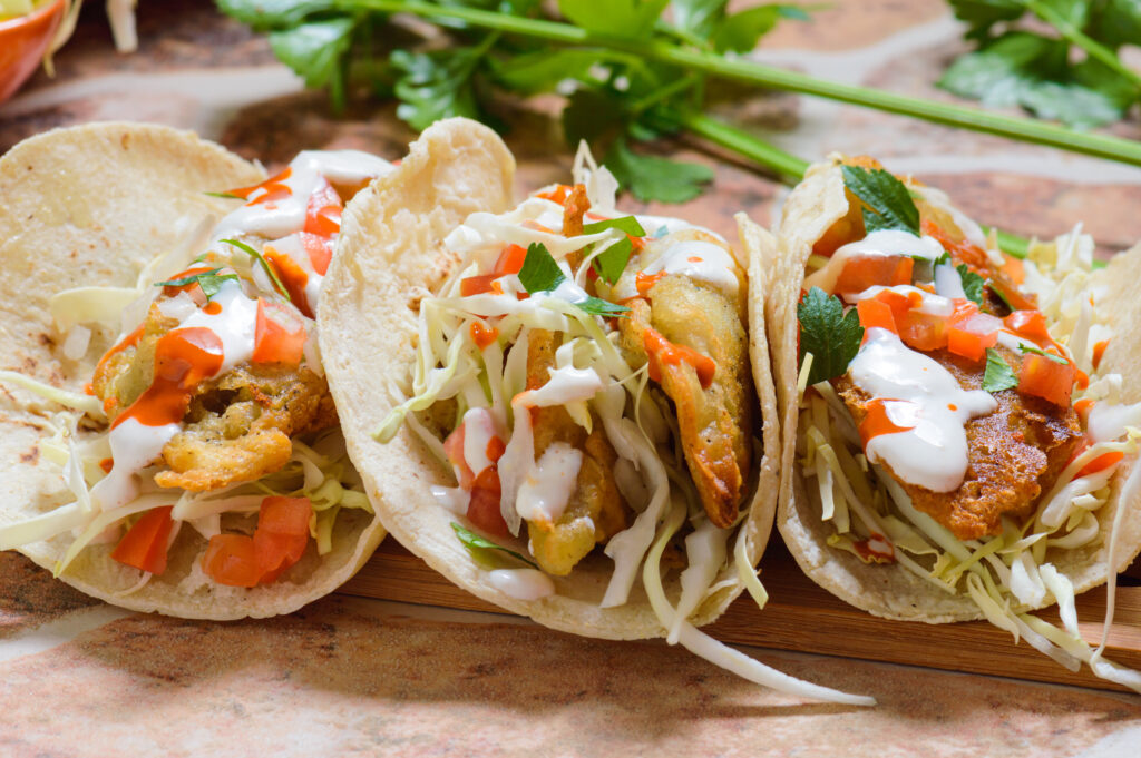 Three Baja style fish tacos