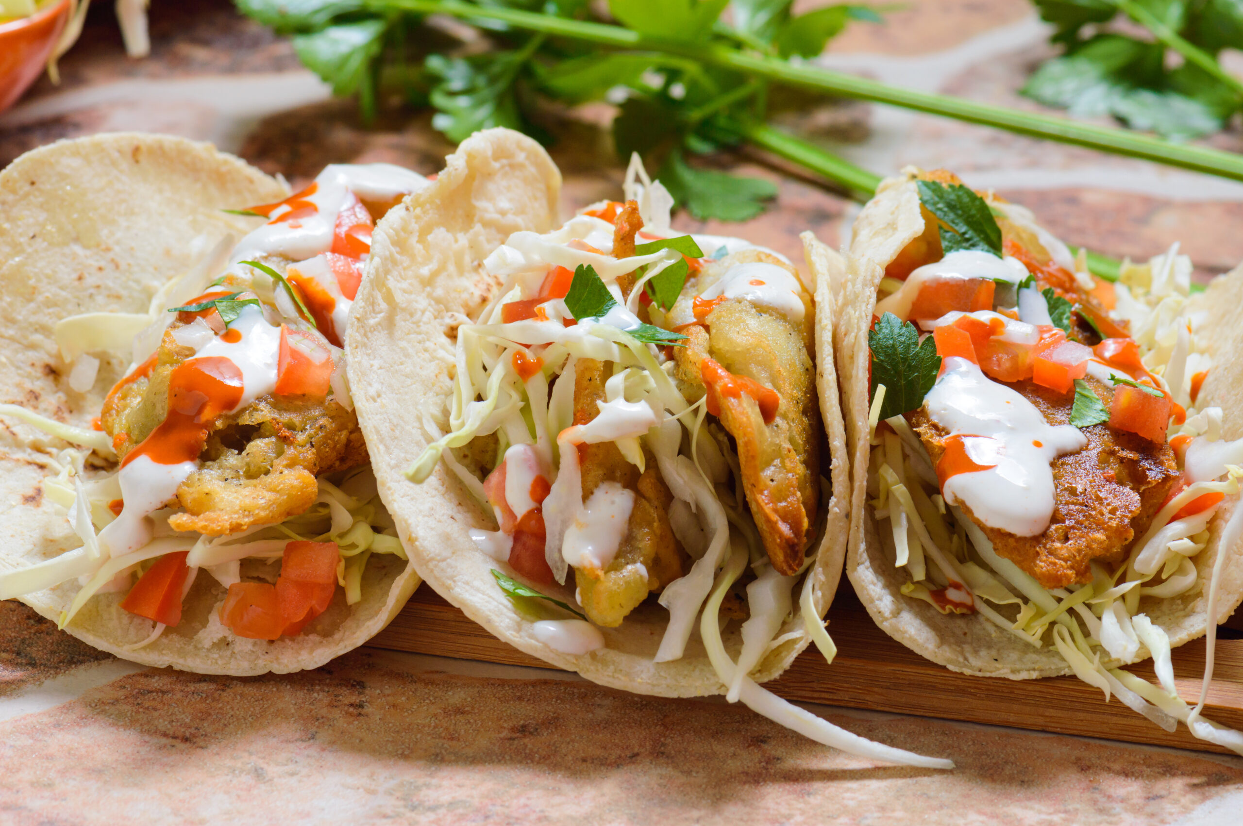 three baja style fish tacos